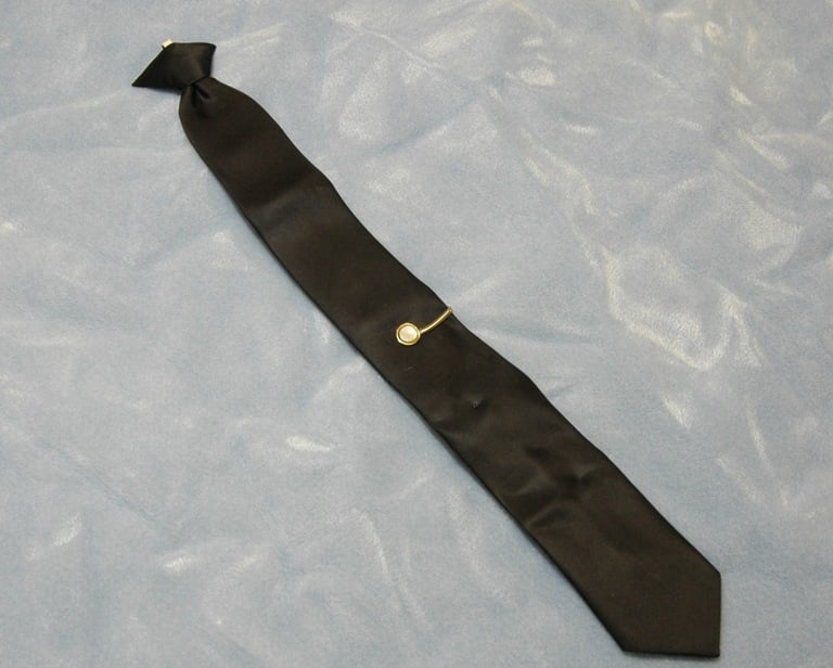 The black necktie left behind by the hijacker on Flight 305, FBI evidence photograph