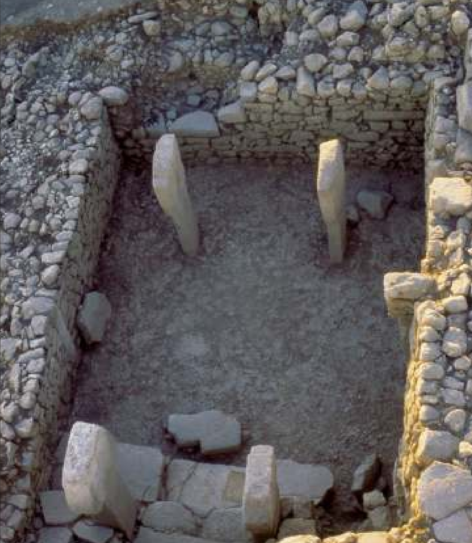 Two central T-shaped pillars standing in situ in the leopard's pillar building at Göbekli Tepe