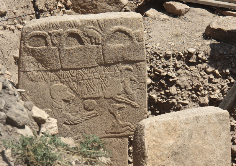 Pillar 43, the Vulture Stone, at Göbekli Tepe, carved with a large bird, a disc and a scorpion